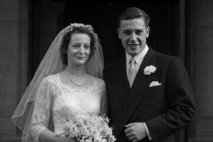 Black and white wedding photo of Jane Ebsworth Oriel and David Attenborough on their wedding day in 1950