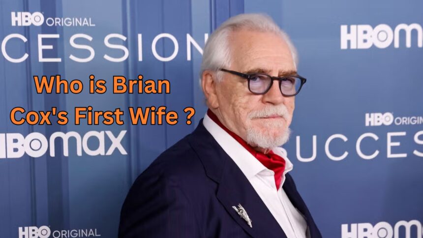 Scottish actor Brian Cox wearing a navy suit and glasses on a red carpet, with text asking "Who is Brian Cox's First Wife?" overlaying the image.