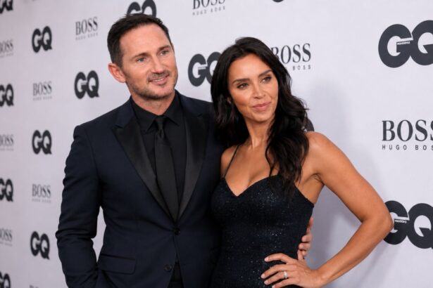 British television presenter attending a formal red-carpet event with her husband