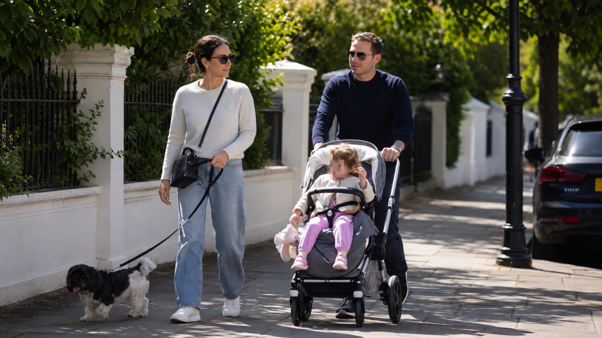 Frank Lampard walking with his family and a child in a stroller