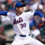Pitcher Luke Weaver in a New York Mets uniform throwing a pitch before his trade to the Pittsburgh Pirates.