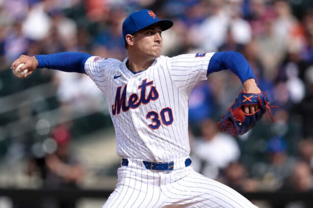 Pitcher Luke Weaver in a New York Mets uniform throwing a pitch before his trade to the Pittsburgh Pirates.