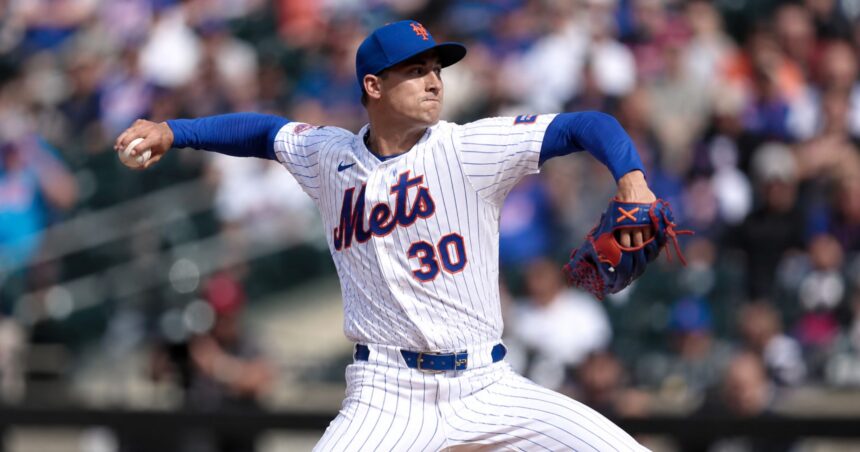 Pitcher Luke Weaver in a New York Mets uniform throwing a pitch before his trade to the Pittsburgh Pirates.